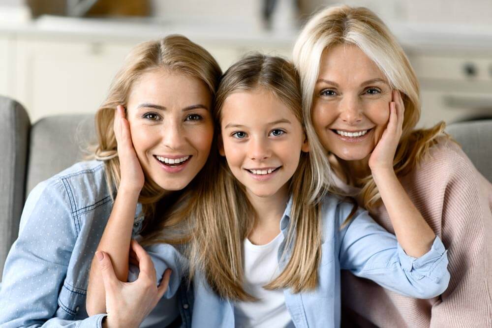 happy grandmother, daughter and granddaughter